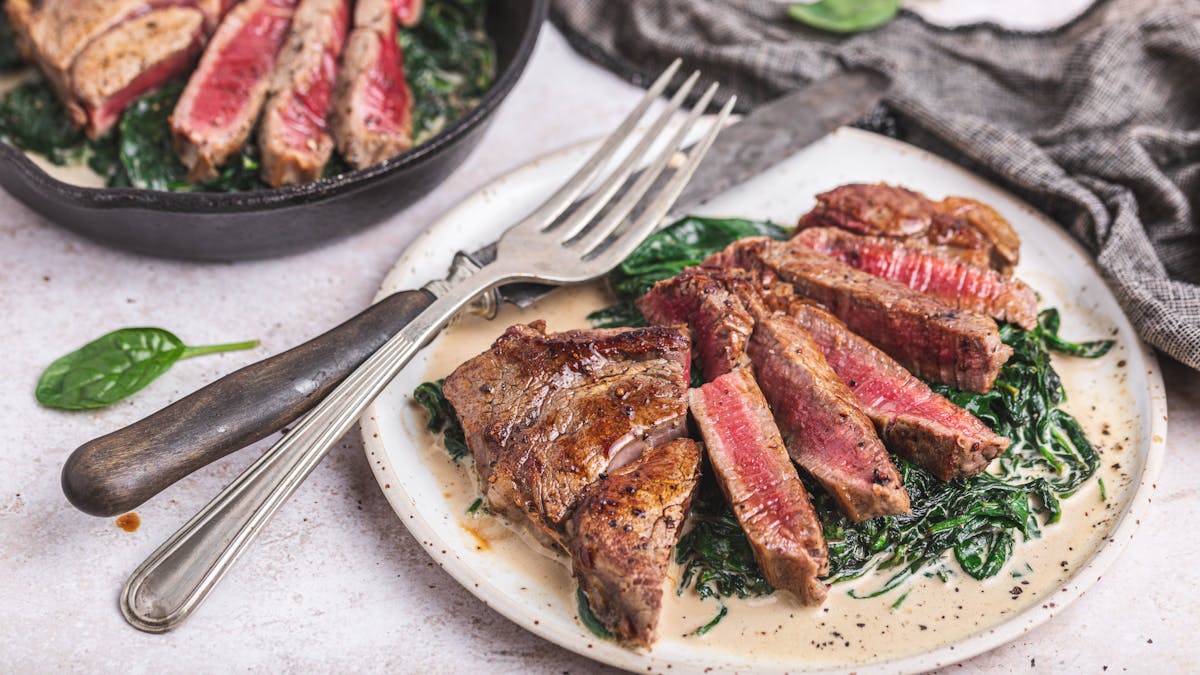 Steak with creamed spinach