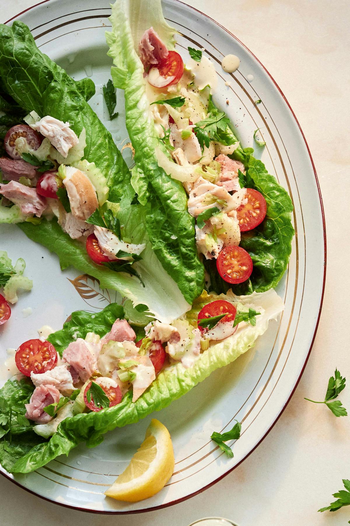 Lettuce cups with deli turkey, tomatoes and mayo