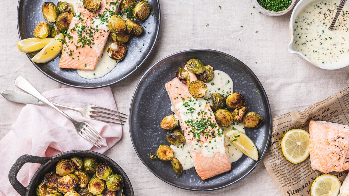 Baked salmon with horseradish cream sauce and roasted Brussels sprouts