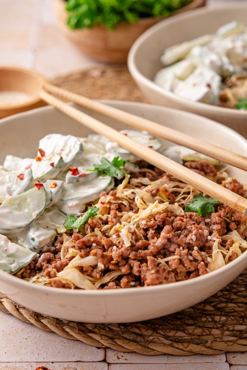 Asian ground beef bowl with creamy cucumber salad