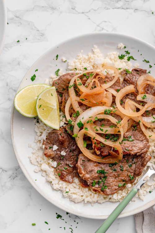 Filipino beef steak (Bistek Tagalog) with cauliflower rice