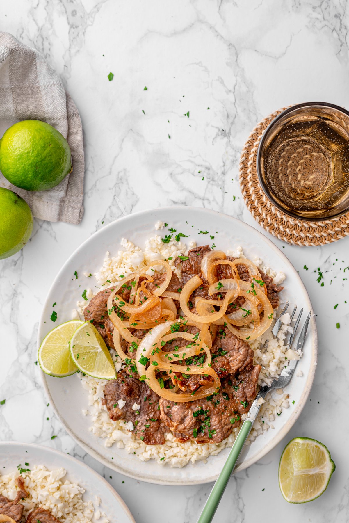 Filipino beef steak (Bistek Tagalog) with cauliflower rice