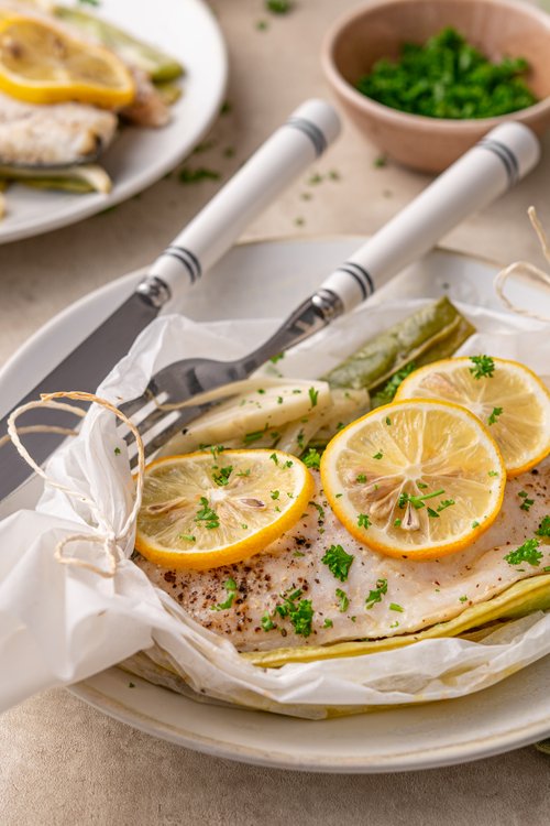 Baked sea bass parcels with lemon and fennel