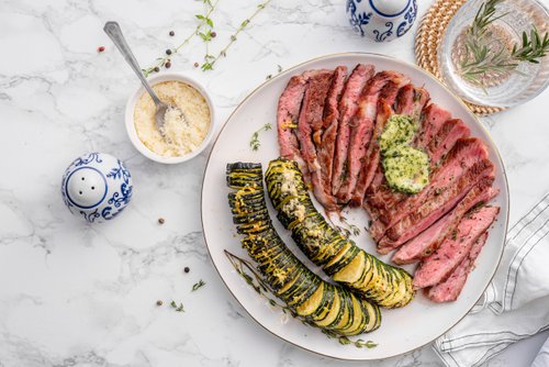 Ribeye with Hasselback zucchini and herb butter