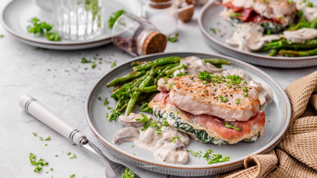 Stuffed pork chops with creamy mushroom sauce