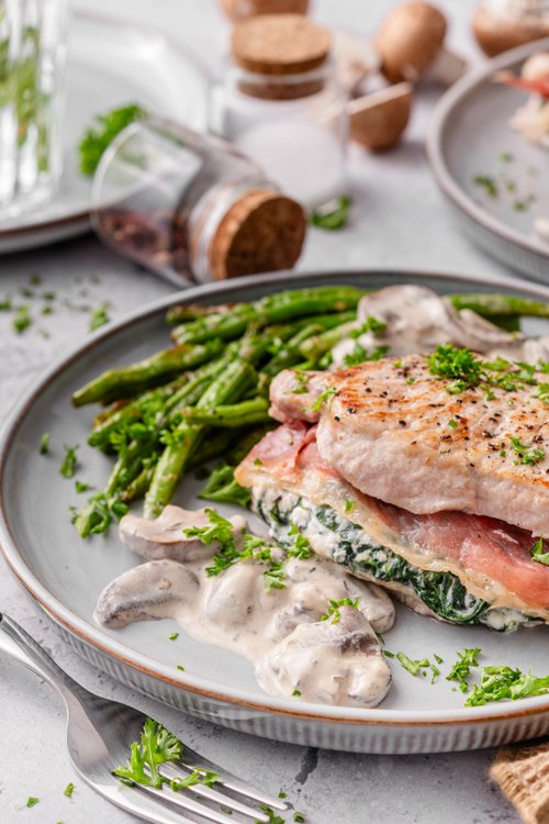 Stuffed pork chops with creamy mushroom sauce