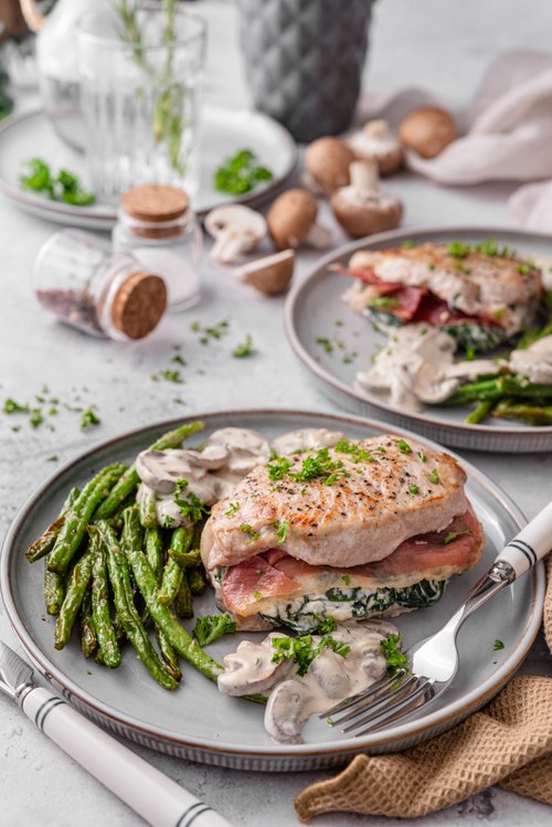 Stuffed pork chops with creamy mushroom sauce