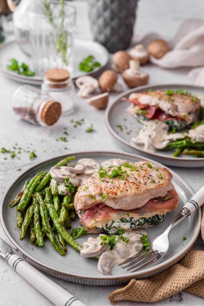 Stuffed pork chops with creamy mushroom sauce